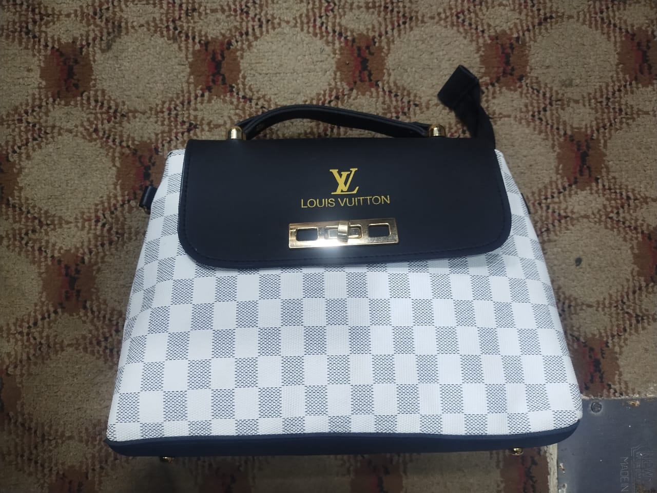 Louis Vuitton Bag With Metal Lock On Flap